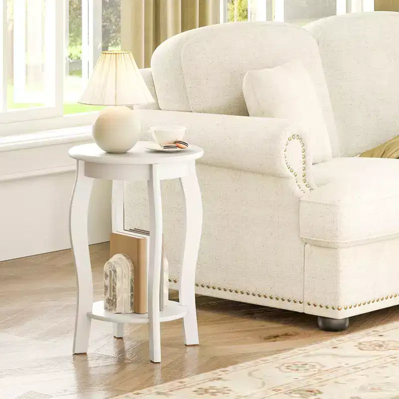 Tavolino rotondo bianco a 2 ripiani con mensola contenitore e gambe in legno